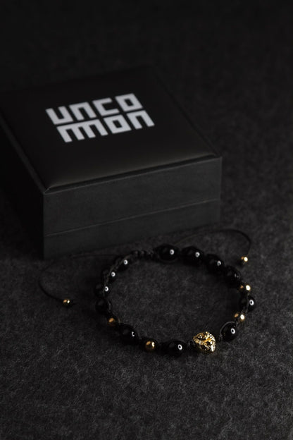 UNCOMMON Men's Beads Bracelet One Gold Lion Charm Black Onyx Beads by Bastion Bolt Action Pen