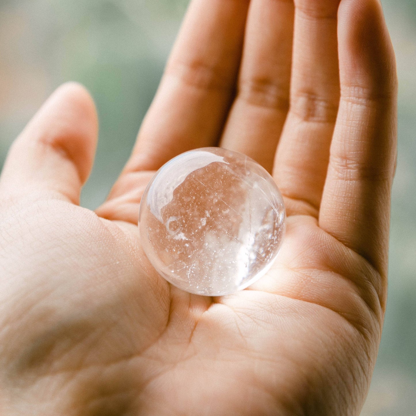 Clear Quartz Sphere with Tripod by Tiny Rituals